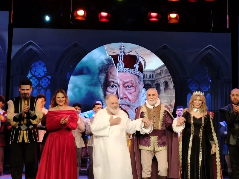 Yehia El-Fakharany, in white, takes his bow with the cast of King Lear at the National Theatre